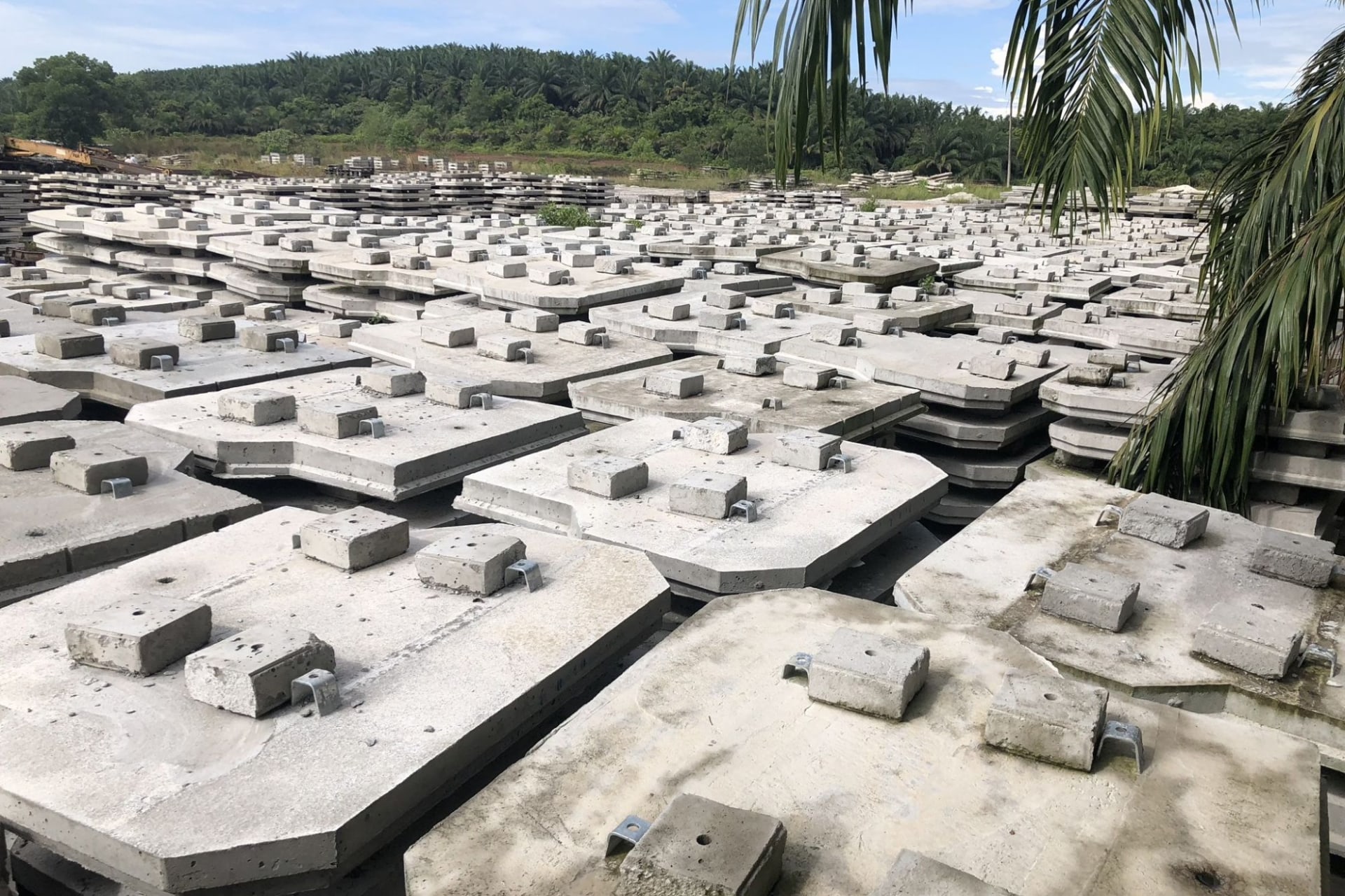 Octagonal precast facing panels stacked in factory yard
